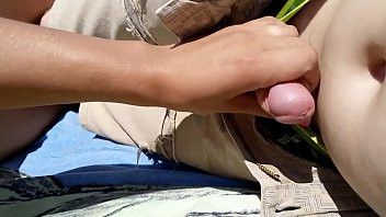 Play Girl Masturbates boyfriend on a public beach